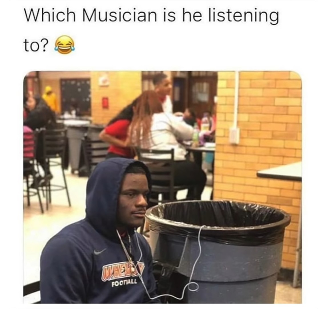Comment what musician he's listening to - meme