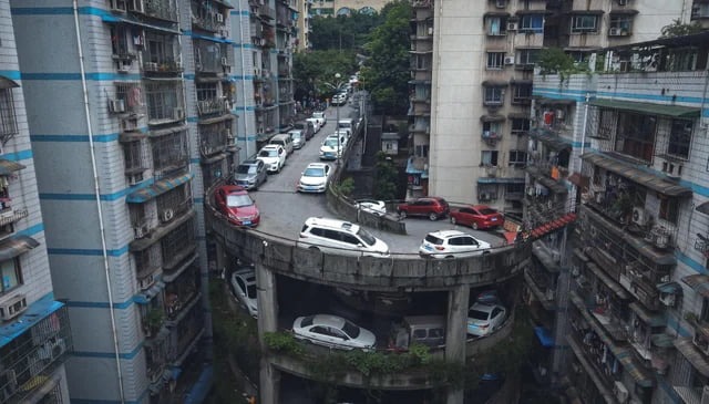 Nope, it's not a parking. It's a real street in Chongqing, China - meme