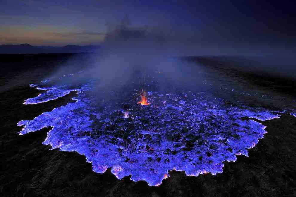 A volcano spewing blue lava - meme