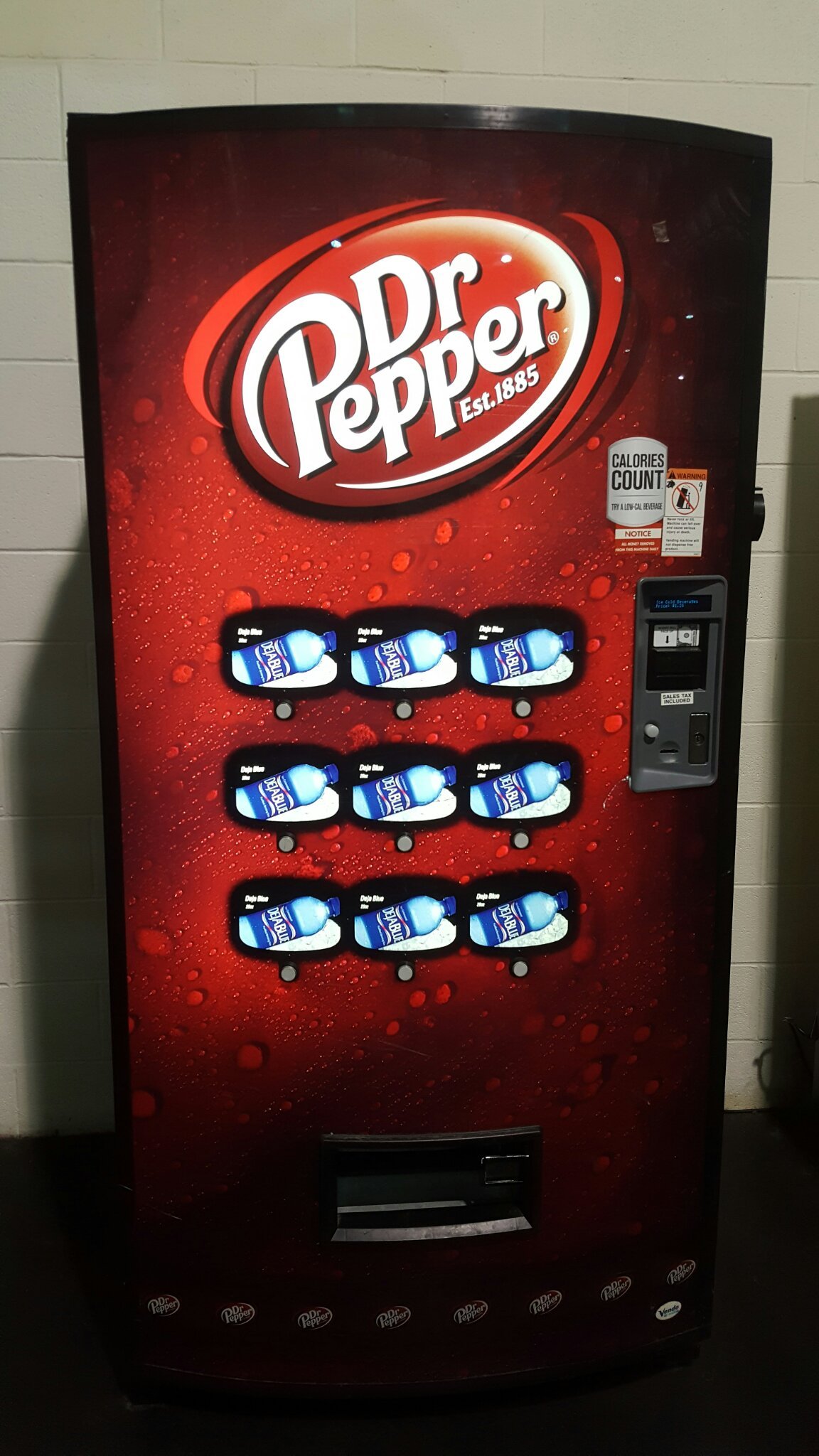 A dr. Pepper machine that only sells water and a sticker that says calories matter - meme