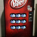 A dr. Pepper machine that only sells water and a sticker that says calories matter