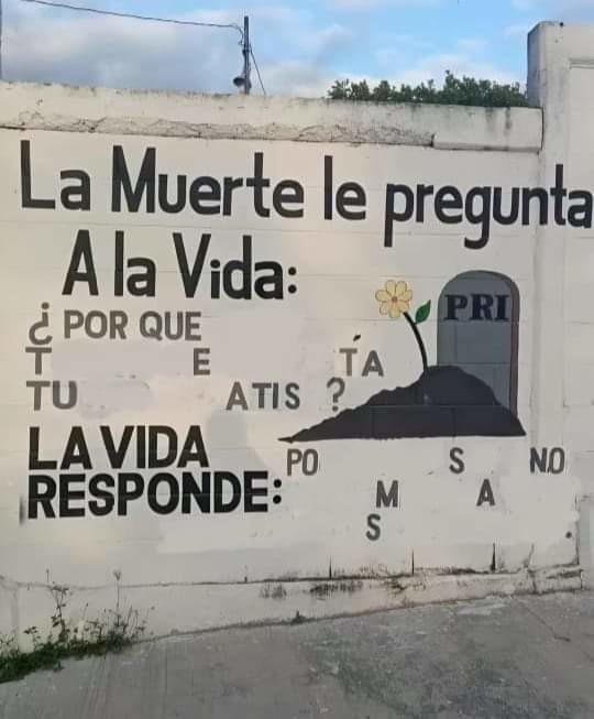En la parti de la nuca una L y un A - meme