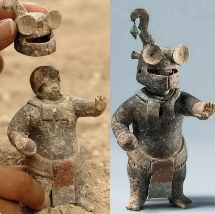 This 1,500-year-old ceramic Maya figurine with removable helmet, from El Perú-Waka', Petén, Guatemala - meme