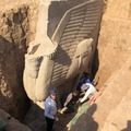 Archaeologists excavate a lamassu at ancient Khursbad in Mesopotamia,Iraq