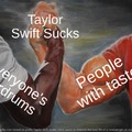 Look at the bottom of the meme. I love Taylor Swift and I'm not on a gunpoint right now