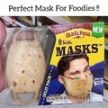 I assert my dominance at supermarkets by eating my face mask taco