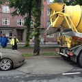 Is that a cement truck or a dump truck? It looks like it just took a dump.