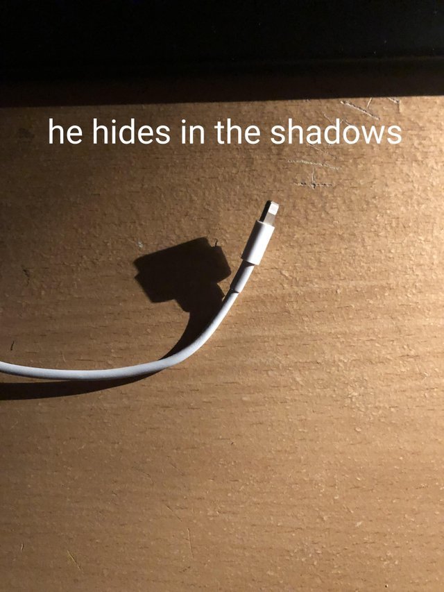 He hides in the shadows - meme