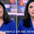 BBC News reporter flipping middle finger