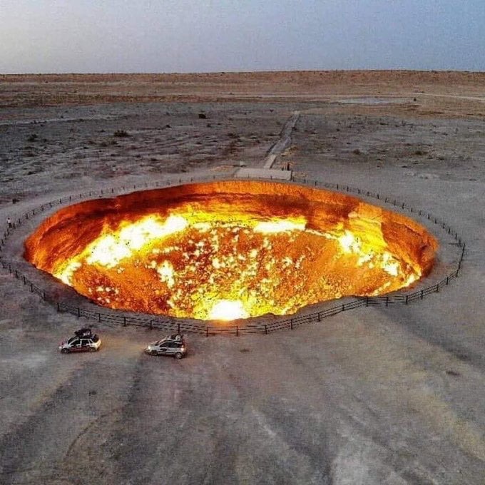 In 1971, Soviet engineers set fire to a gas leak in the Turkmenistan desert, expecting it to burn out quickly. However, the flames continue to blaze to this day, turning the area into a constantly burning pit known as "The Door to Hell." - meme