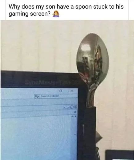 Why is there a spoon taped to the monitor? I’m scared to ask - meme