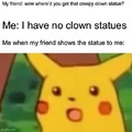 Creepy clown statue