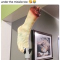 Kiss under this missile toe